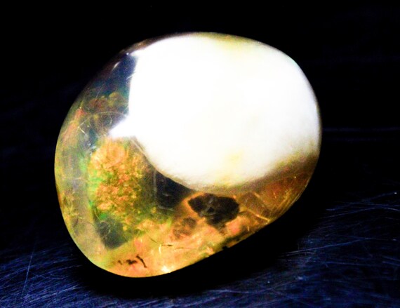 Natural Ethiopian Opal Polished Raw Specimen: Multi-Fire Gemstone (37x32x20 MM, 111.70 Carats)