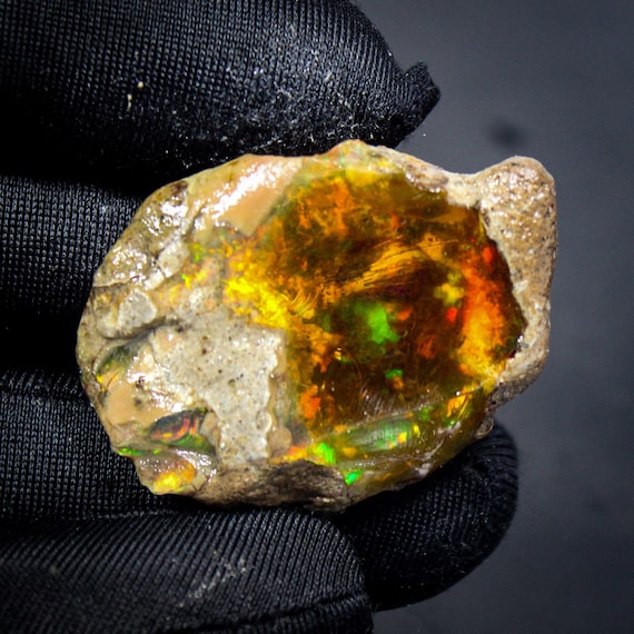 Ethiopian Opal Raw Specimen: Natural Rainbow Fire Stone (36X27X12 MM, 55 CTS)
