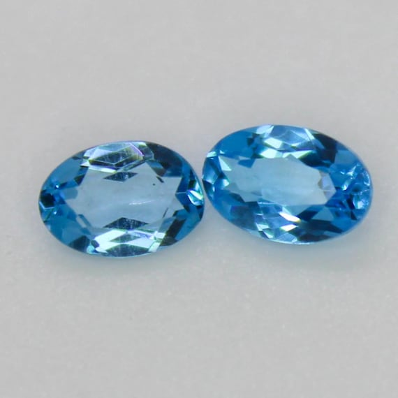 Natural Sky Blue Topaz Cut 2 Piece Lot Pair : Oval Faceted Gemstones, 1.05 Carats