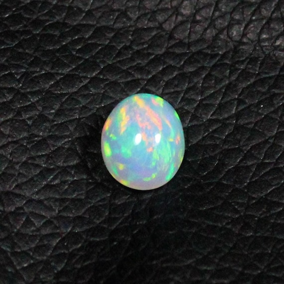 Welo Opal Cabochon: Oval Multi Fire Ethiopian Opal, 2.20 Carat (10X8X5 MM)