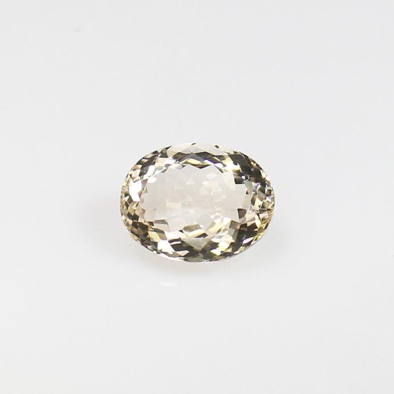 Faceted Peach Morganite Gemstone: Oval Stone, 1.75 Carats