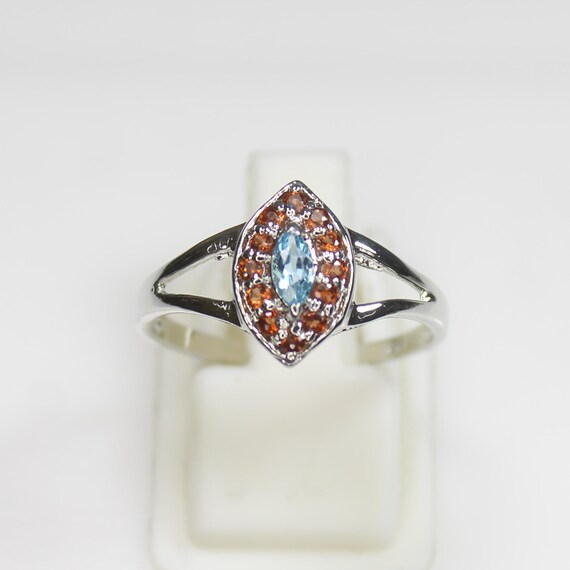 Natural Blue Topaz Vintage Ring With .925 Sterling Silver And Red Garnet Around Available With All U.S Sizes