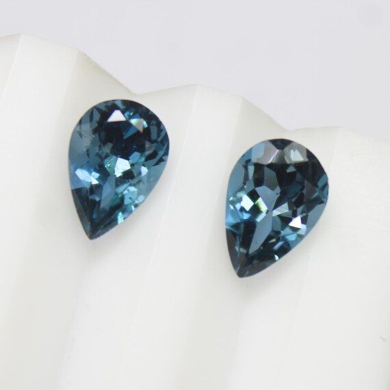 Pear Shape London Blue Topaz Pair: 3.90 Carats, 9x6x5 mm