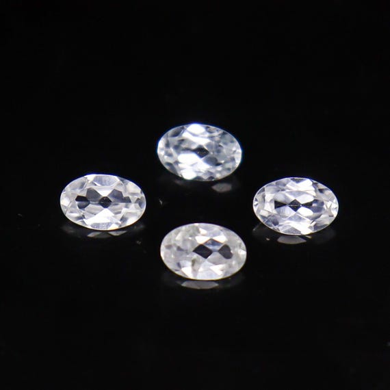 Faceted White Zircon Gemstones: 2.45 Carats, Oval, 6x4 mm (4 Pieces
