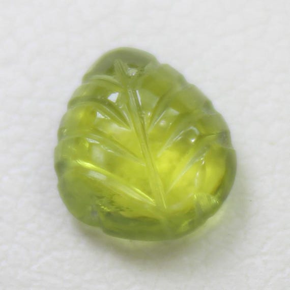 Natural Green Peridot Carving: 1.20 Carat Fancy-Shape Gemstone 7x6x3 mm Size
