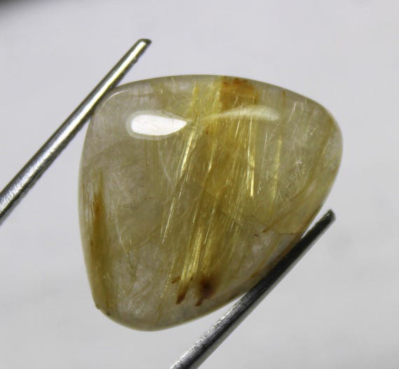 Golden Rutile Quartz Cabochon: Trillion Gemstone, 16.45 Carats