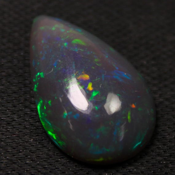 Natural Black Ethiopian Opal Cabochon: Pear Shape Gemstone (21x13x5 MM, 7.05 Carat)