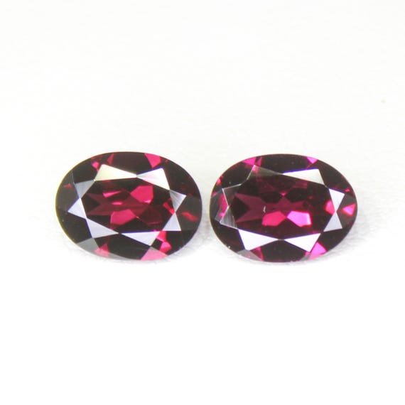 Faceted Rhodolite Garnet Pair: Oval Cut Pink Gemstones, 2.90 Carats
