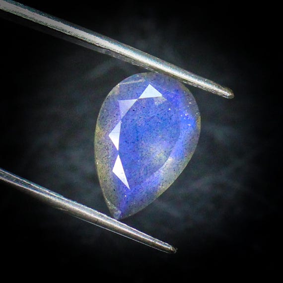 Faceted Black Labradorite Pear Cabochon: 4.30 Carats, 15x10x5 mm