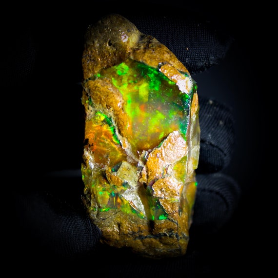 Natural Ethiopian Opal Raw Specimen: Rainbow Fire Rough (61X26X25 MM, 244.95 CTS)