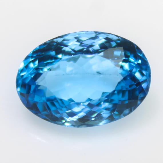 Natural Swiss Blue Topaz Faceted: 10.30 Carat Oval Shape Cut Gemstone, 15x11x8 mm