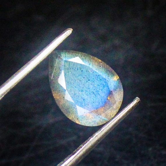 Faceted Black Labradorite Pear Cabochon: 3.65 Carats, 12x9x6 mm