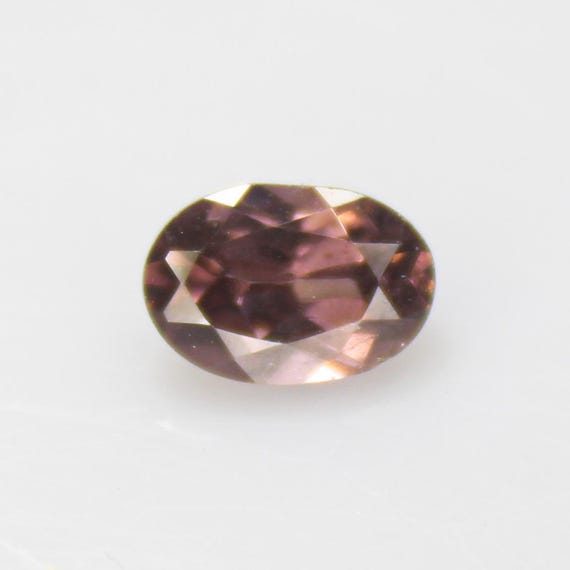 Faceted Brown Zircon: Oval Gemstone, 1.30 Carats, 7x5x3 mm