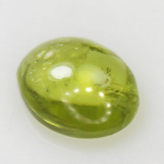 Natural Green Peridot Cabochon: 1.80 Carat Oval-Shape Gemstone 9x7x3 mm Size