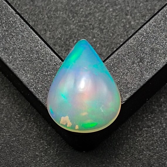 Natural Opal Cabochon: Natural Oval Multi-Fire Gemstone, 2.60 CTS (12X10X5 MM)