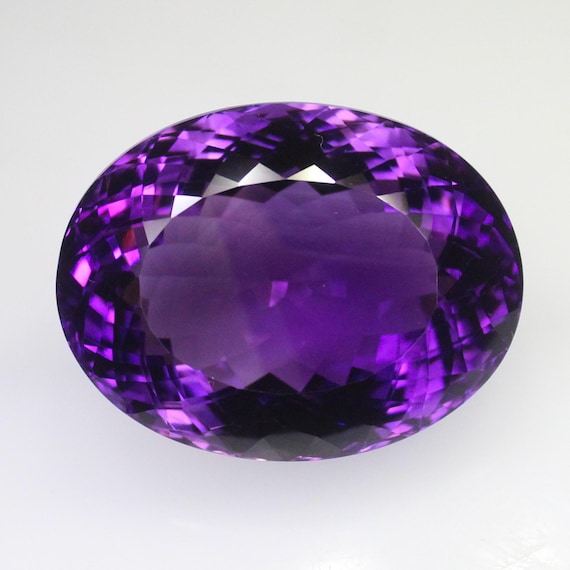 Natural Faceted Purple Amethyst Piece In Oval Shape 67.35 Carats 29x22x16 mm Size