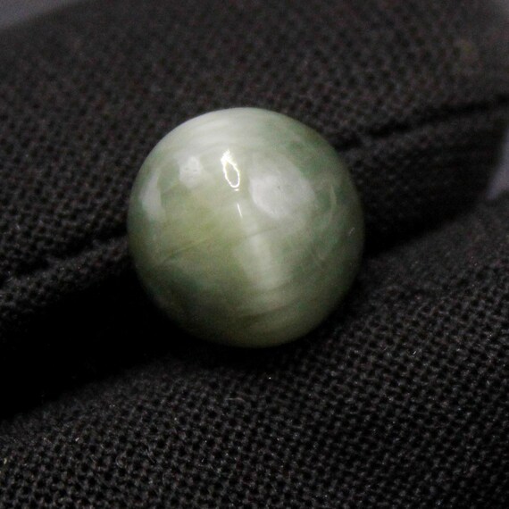 Natural Green Cat's Eye Cabochon: Round Shape 5.80 Carat Gemstone