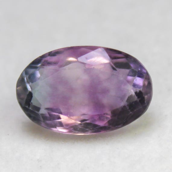 Natural Faceted Multi Colour Fluorite Gemstone : Oval Shape, 7.10 Carat (14x9x7 MM)