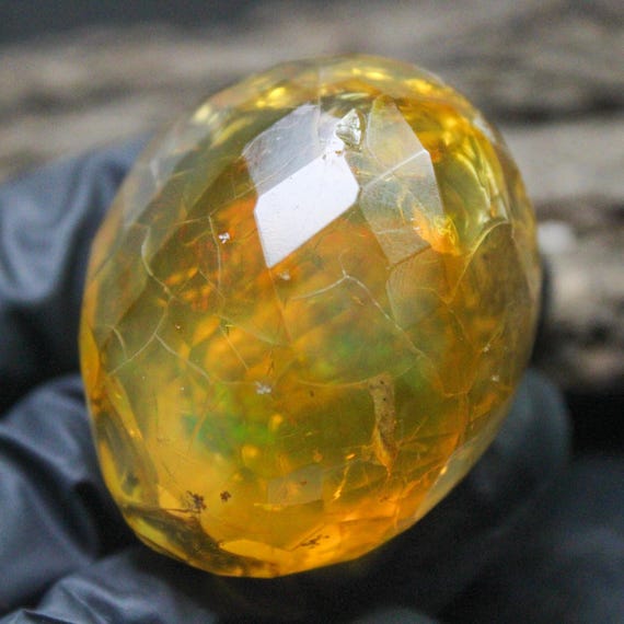 Faceted Ethiopian Opal Specimen: Raw Multi Fire Opal (43x34x29 MM, 236.46 Carats)