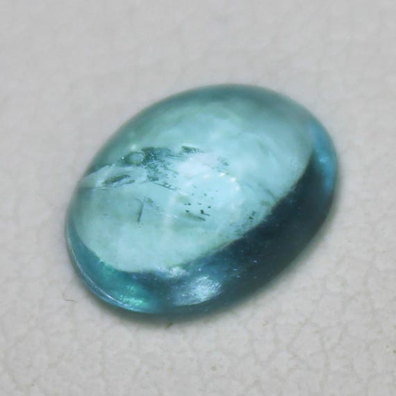 Natural Blue Apatite Cabochon: 1.05 Carat In Oval Shape Gemstone, 7.5x6x3 mm