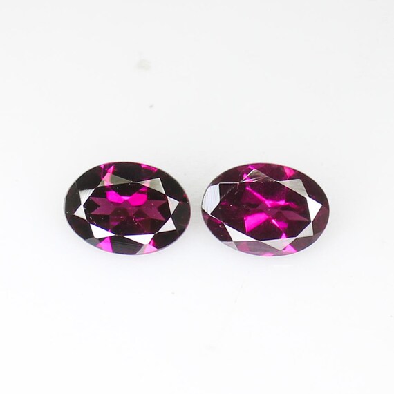 Faceted Rhodolite Garnet Pair: Oval Pink Gemstones, 1.85 Carats