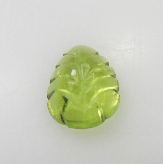 Natural Green Peridot Carving: 1.28 Carat Fancy-Shape Gemstone 8x6x3 mm Size