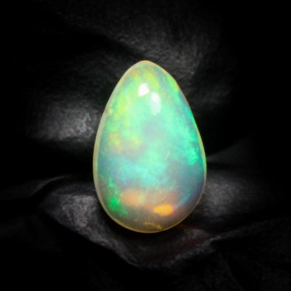 White Ethiopian Opal Cabochon Pear Shape: 2.30 Carats, 13x8x5 mm