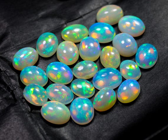 Natural Ethiopian Opal Cabochon: AAA Grade Oval, Multi Fire Color