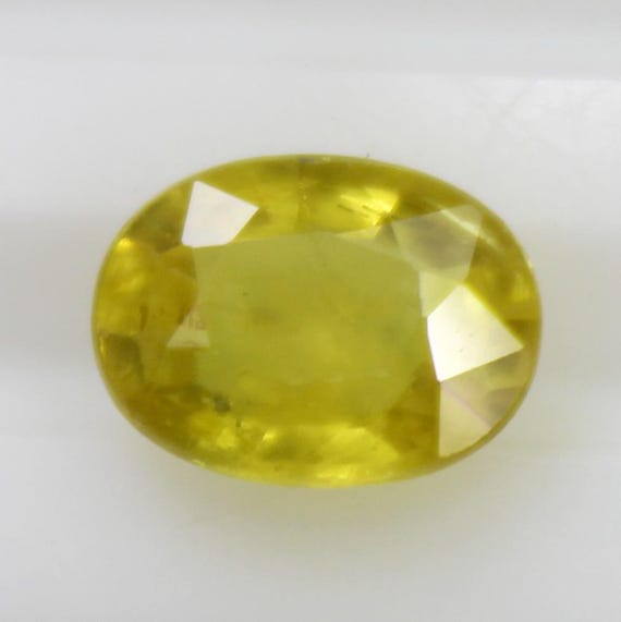 Natural Faceted Yellow Sapphire Piece In Oval Shape 1.20 Carats 7x5x3 mm Size