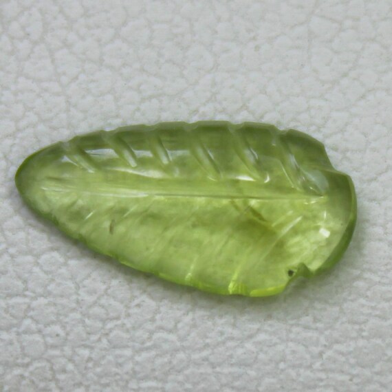 Natural Green Peridot Carving: 1.00 Carat Fancy-Shape Gemstone 11x6x2 mm Size