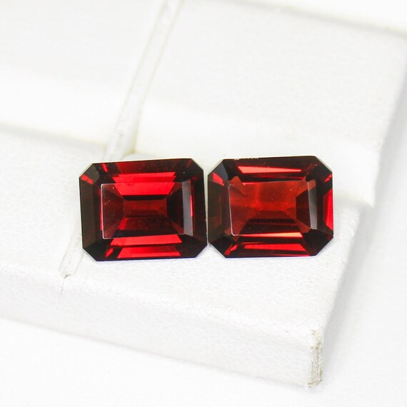 Faceted Red Garnet Pair: Emerald Cut Gemstones, 6.75 Carats
