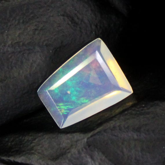 Faceted Ethiopian Opal Gemstone: 1.00 Carat Fancy Shape, 10x8x3 mm