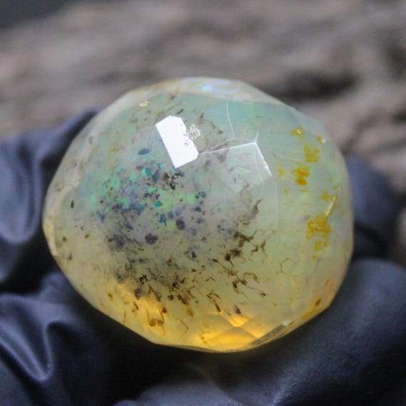 Faceted Ethiopian Opal Specimen: Raw Multi Fire Opal (32x28x22 MM, 102.80 Carats)