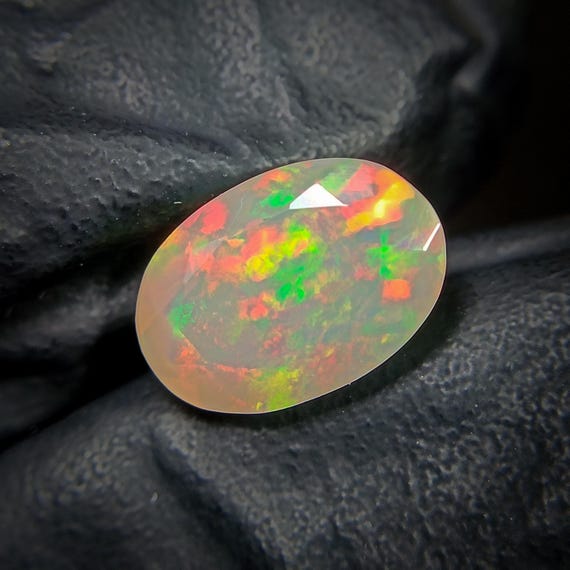 Faceted Ethiopian Opal: Oval Welo Fire Opal Gemstone (11x8x5mm)
