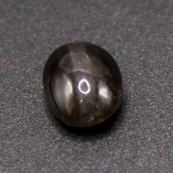 Natural Black Cat's Eye Cabochon: Oval 3.40 Carat Gemstone