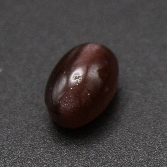 Natural Red Cat's Eye Cabochon: Oval 5.70 Carat Gemstone