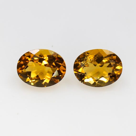 Natural Faceted Yellow Citrine Pair: Oval Gemstones, 3.60 Carats