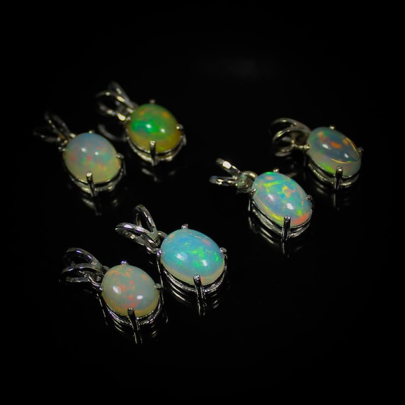 Natural Ethiopian Opal Pendant: .925 Sterling Silver, White Opal