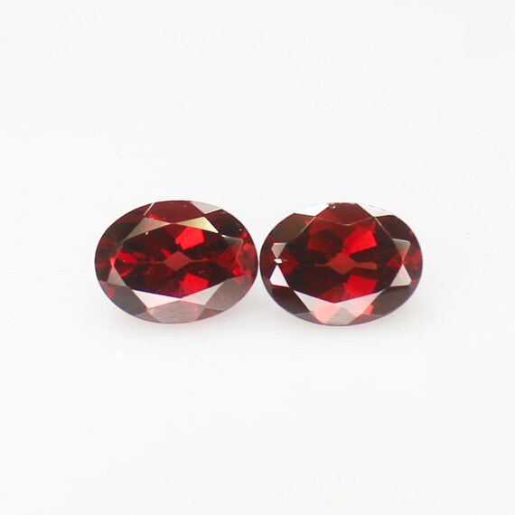Faceted Red Garnet Pair: Oval Cut Gemstones, 3.65 Carats