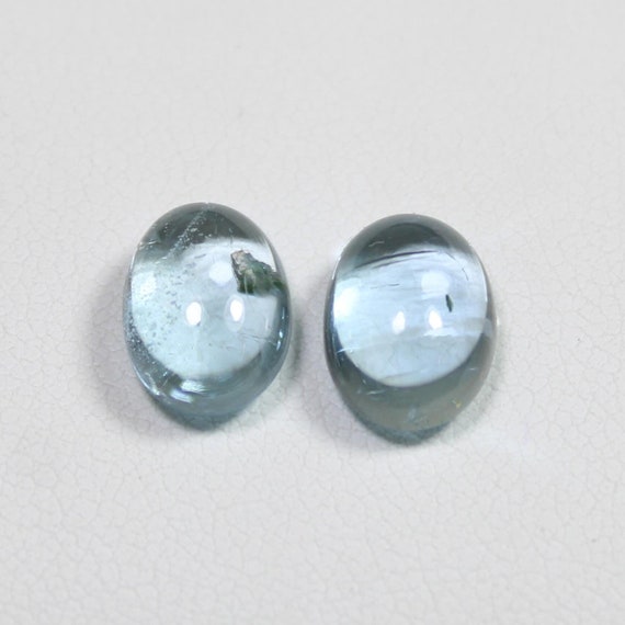 Natural Blue Aquamarine Cabochon Pair: Oval Gemstone (5.40 Ct, 10x7x5 MM)