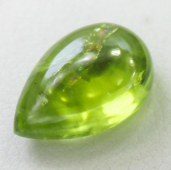Natural Green Peridot Cabochon: 4.10 Carat Pear-Shape Gemstone 12x8x5 mm Size