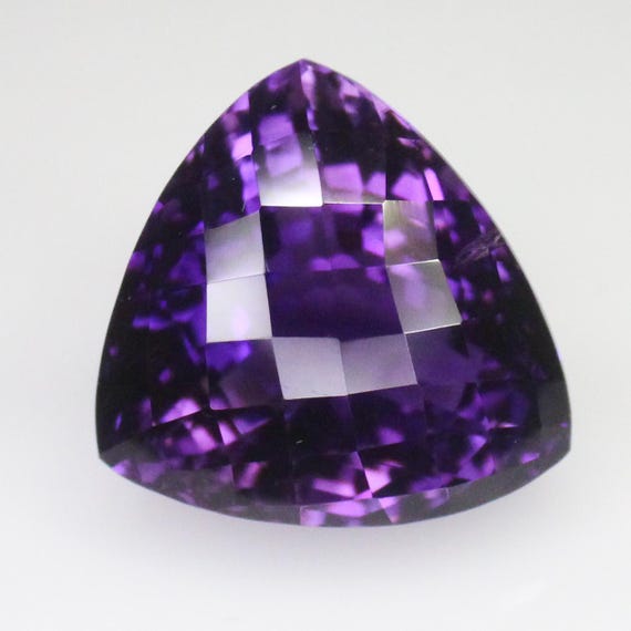 Natural Faceted Purple Amethyst Piece In Trillion Shape 35.00 Carats 19x19x16 mm Size