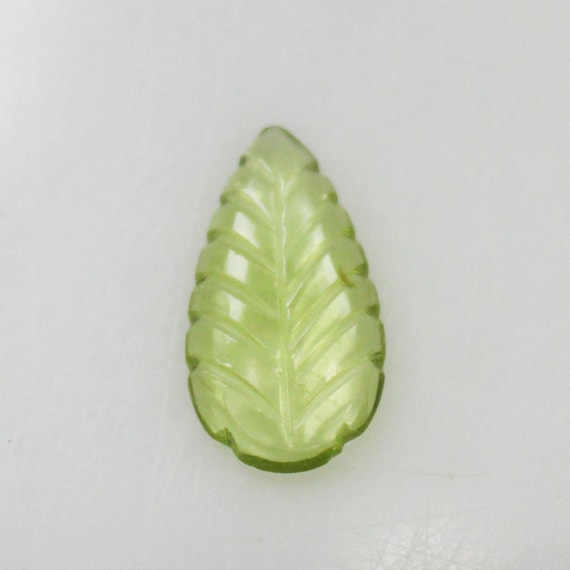 Natural Green Peridot Carving: 1.20 Carat Fancy-Shape Gemstone 12x6x1 mm Size
