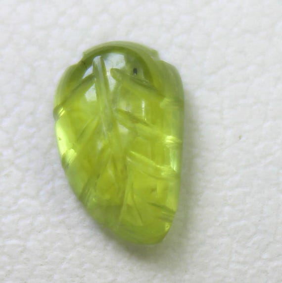 Natural Green Peridot Carving: 1.10 Carat Fancy-Shape Gemstone 8x5x3 mm Size