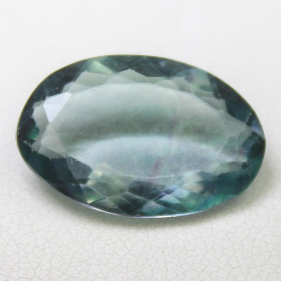 Natural Faceted Multi Colour Fluorite Gemstone : Oval Shape, 10.70 Carat (18x12x6 MM)