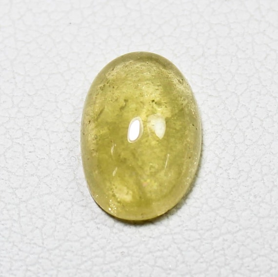 Yellow Tourmaline Cabochon: 2.50 Carat Oval Gemstone, 10x8x4 mm