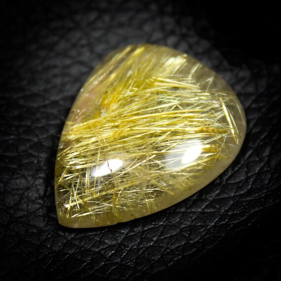 Natural Golden Rutile Quartz Pear Cabochon (26x20x6 MM, 27.00 Cts)