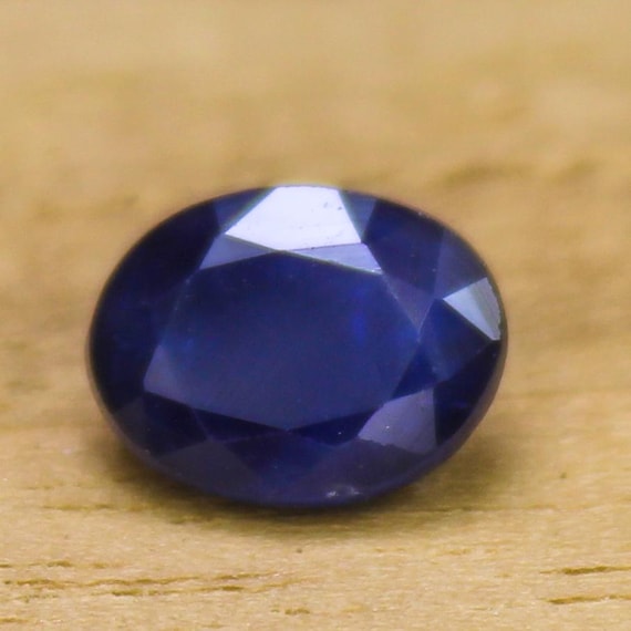 Faceted Oval Blue Sapphire Gemstone: 1.60 ct, 7.5x5.5x4 mm