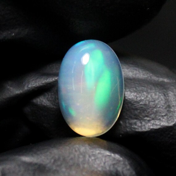 Natural White Ethiopian Opal Cabochon: Oval Gemstone, 3.00 Carats