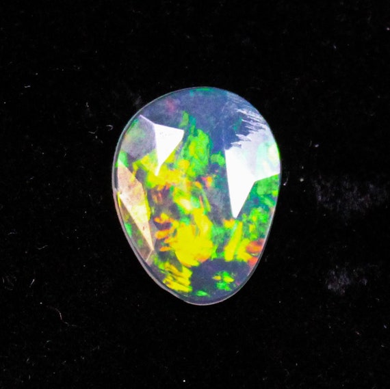 Natural Ethiopian Opal Slice: Oval Rose Cut Gemstone (1.10 Cts, 12X10X2 MM)